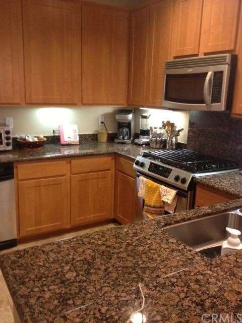 Kitchen offers expansive counter and cabinet space