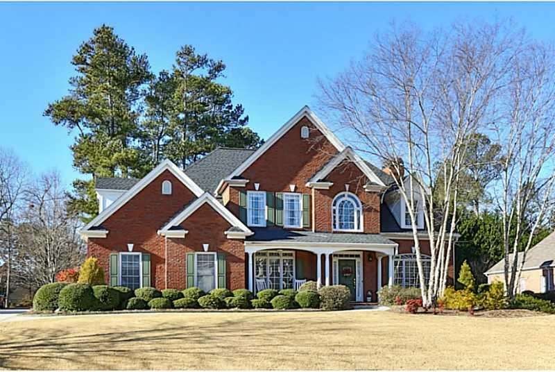 Exterior Front. Custom-built 4 sided Brick home, C