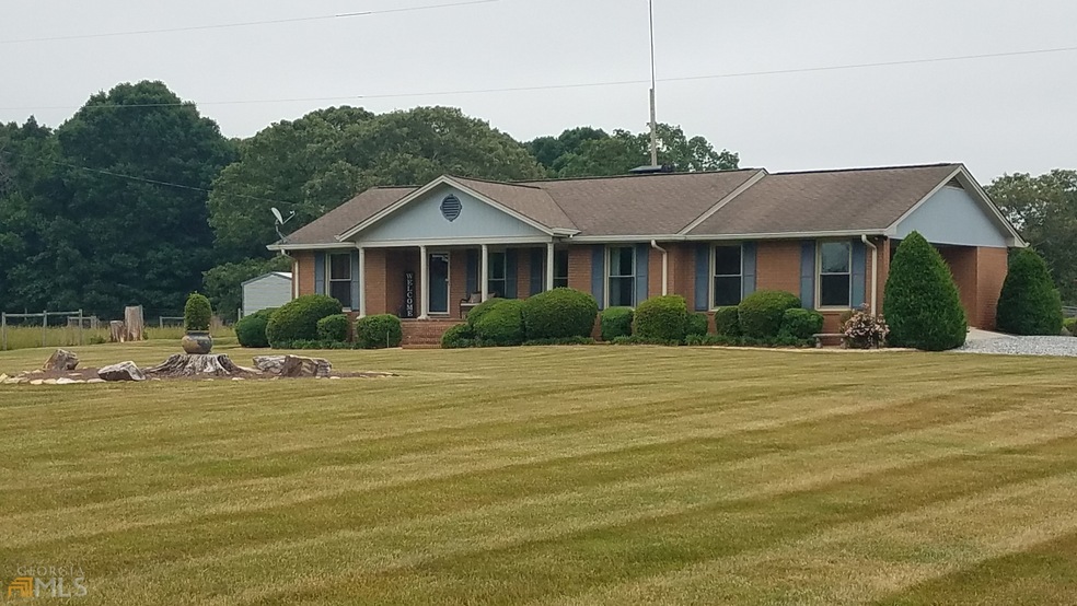 695 Highway 323, Gillsville, GA 30543 - photo 1