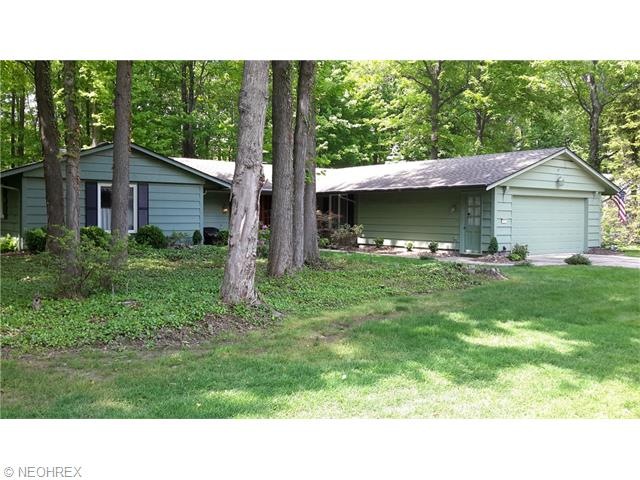 GORGEOUS CEDAR SIDED HOME ON WOODED LOT