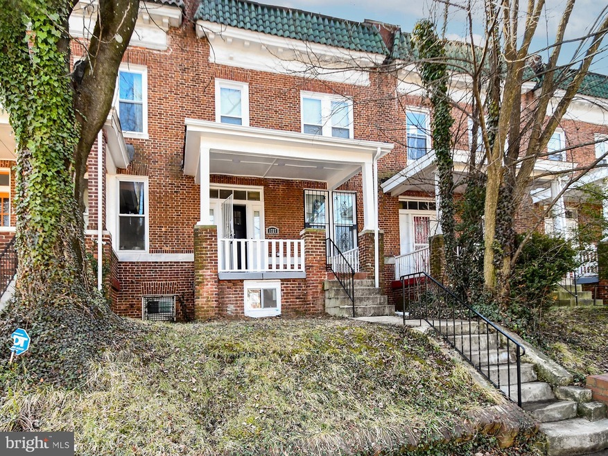 1727 E 33rd St, Baltimore, MD 21218 - photo 1