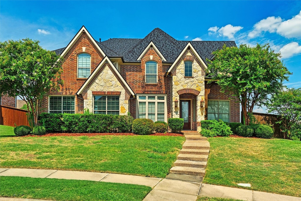 Tudor home with a front yard
