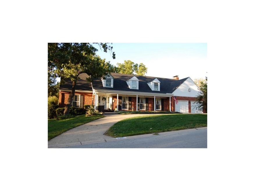 Front view of home. Large circle drive.