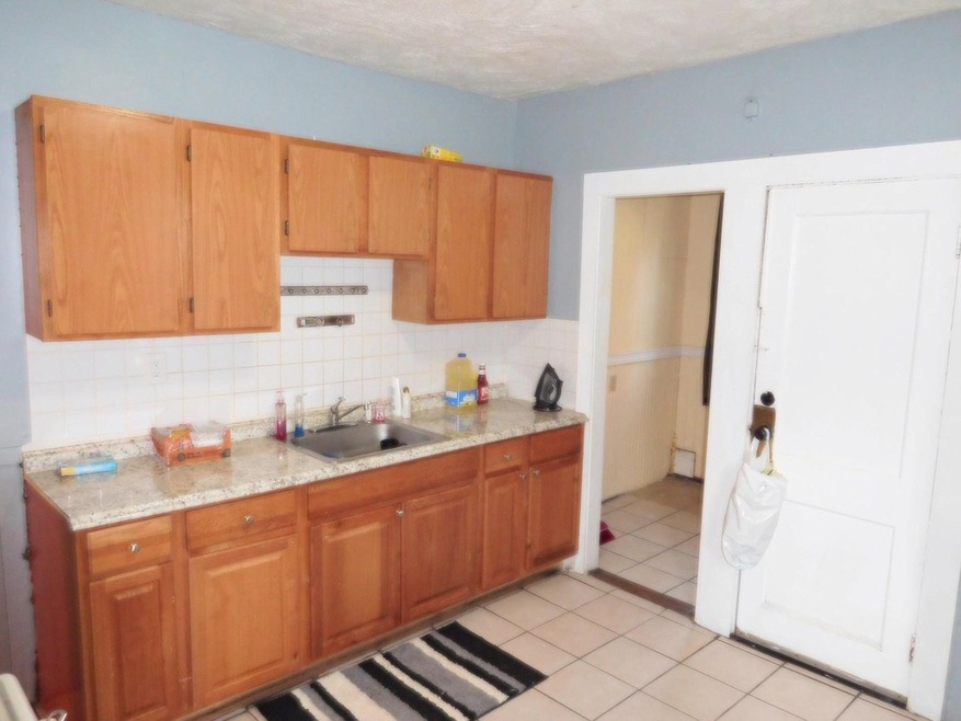 54 Lithgow St unit 1, Dorchester Center, MA 02124 - photo 1