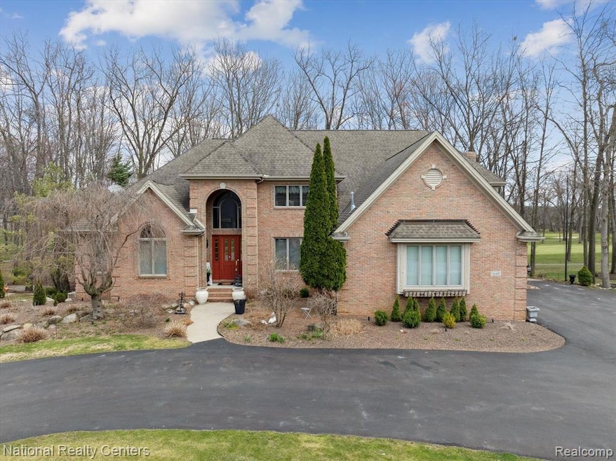 1449 Gleneagles unit 257, Highland, MI 48357 - photo 1