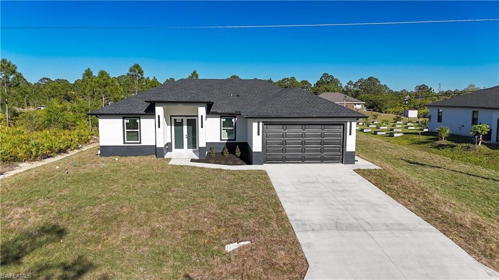 View of front of house featuring a garage, a front