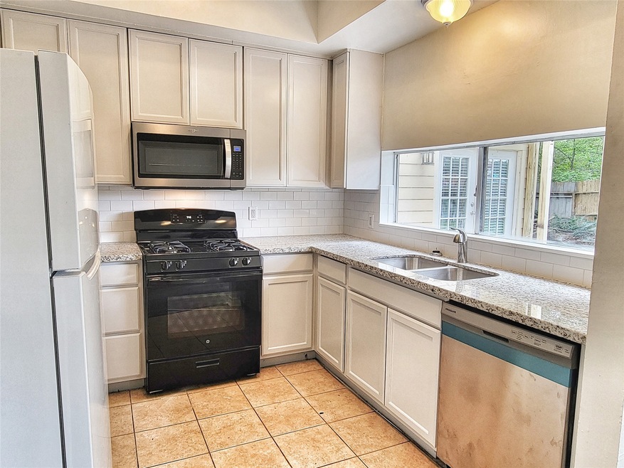 1623 W Adoue St, Alvin, TX 77511 - photo 1