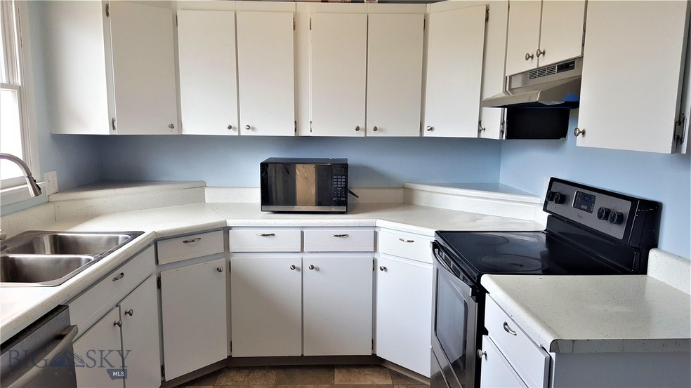 Kitchen space, window to the back yard.