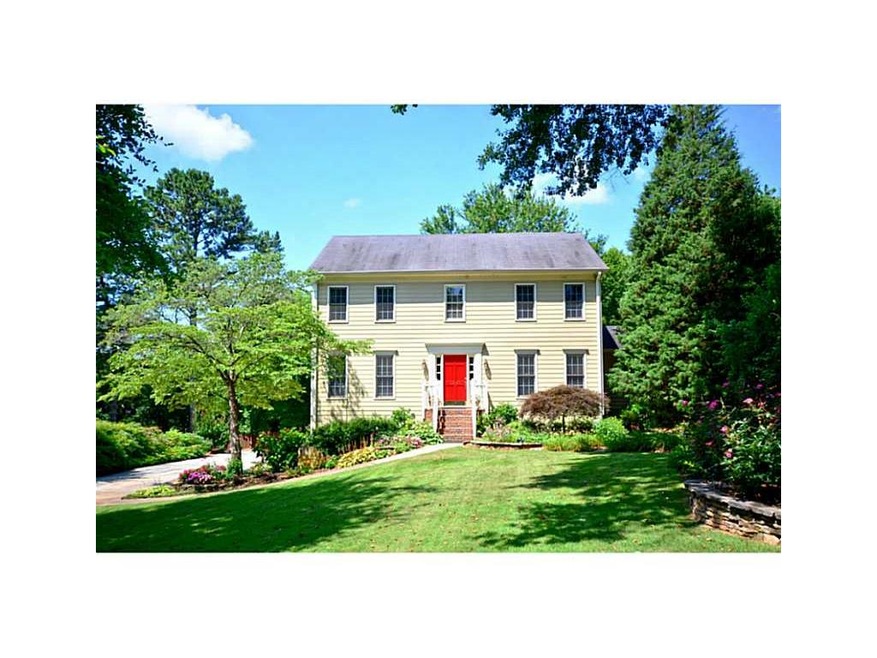Exterior Front. Beautiful curb appeal with lush la