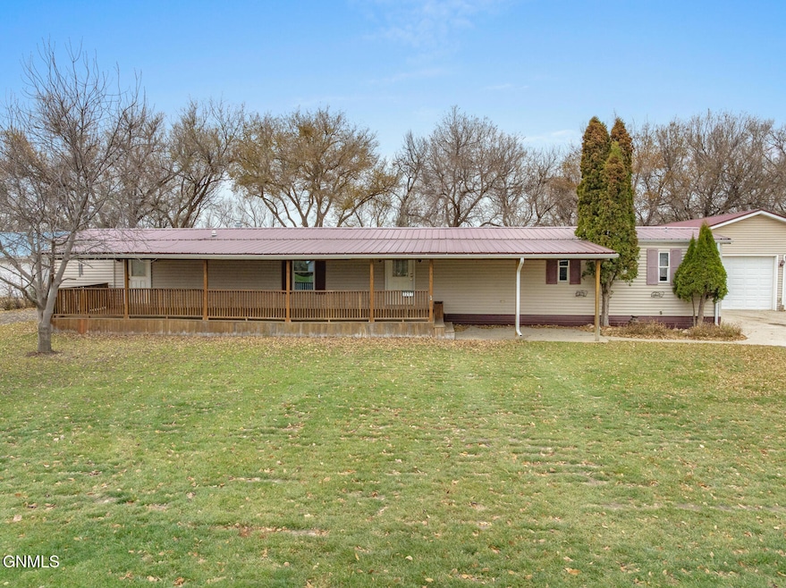 3207 9th Ave E, Williston, ND 58801 - photo 1