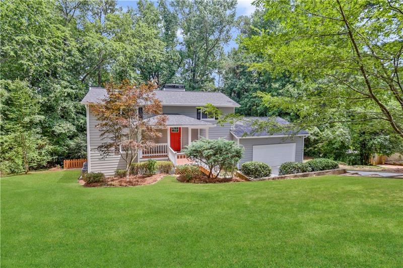 5789 Chisholm Trail SW, Lilburn, GA 30047 - photo 1