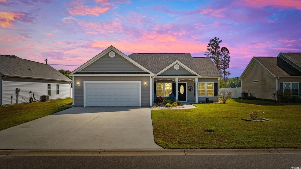 View of front facade with an attached garage, cent