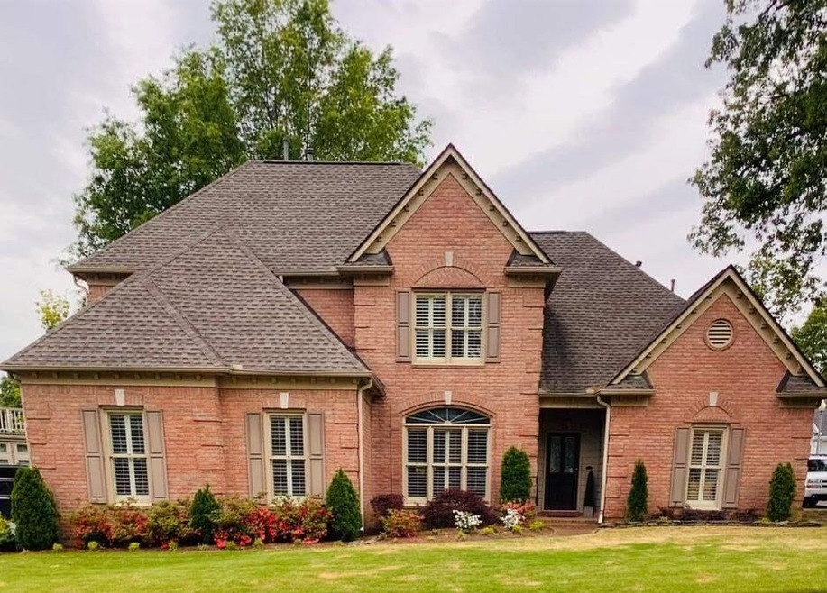 This all brick home with side entry double garage,