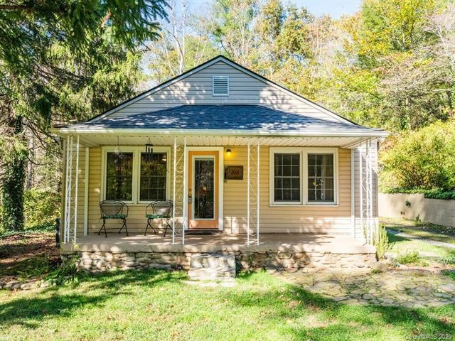 Front view of home with covered front porch & 2018
