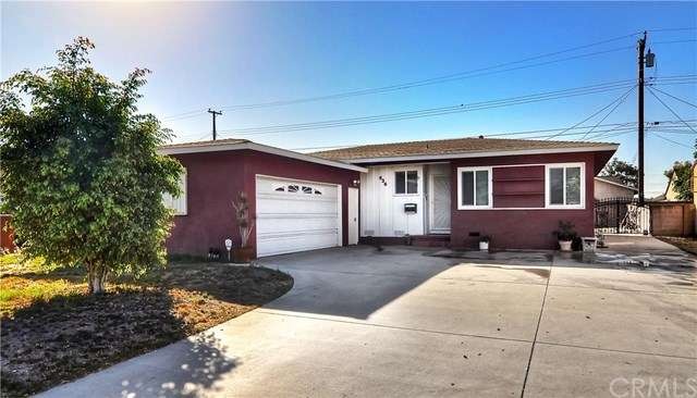 Front of the home with Huge driveway that fits 5 c