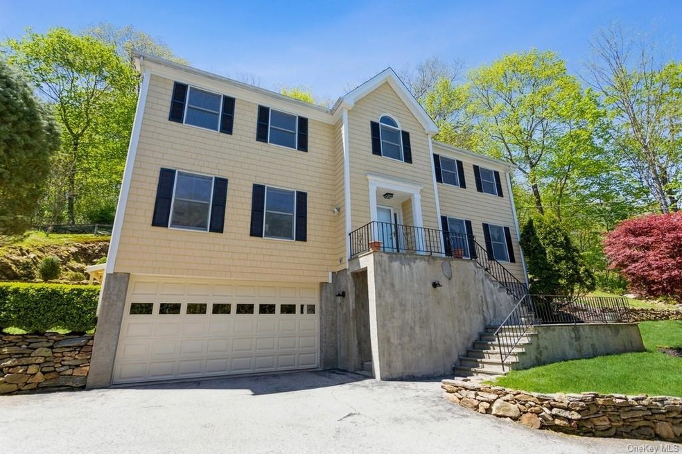Welcome to this Turnkey Colonial in Pleasantville 