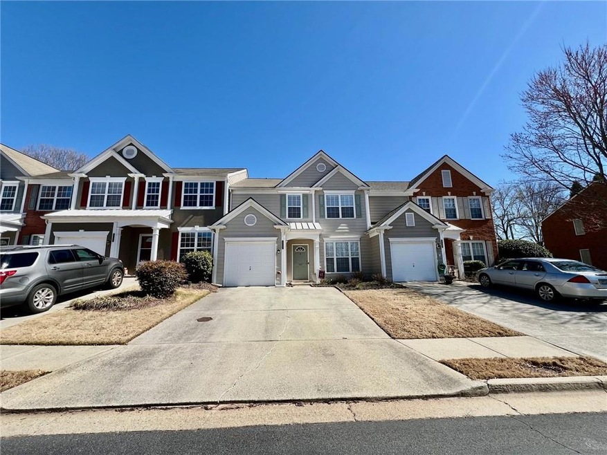 View of front of property featuring driveway