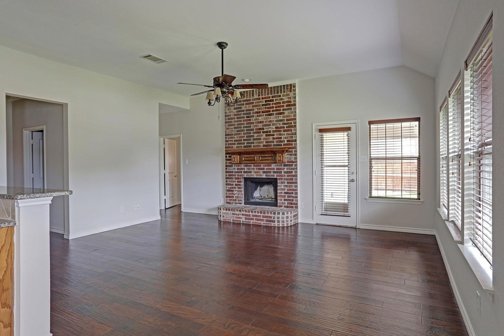 Unfurnished living room with plenty of natural lig