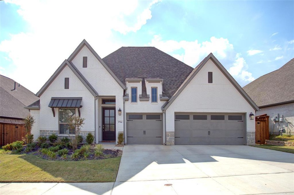 Front with 3 car garage