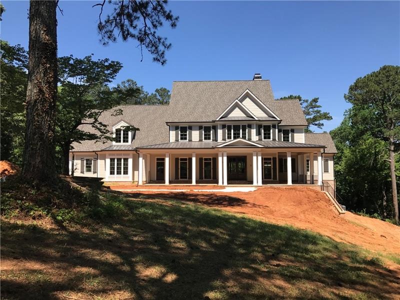 Incredible home on 3 acres with a beautiful lake i