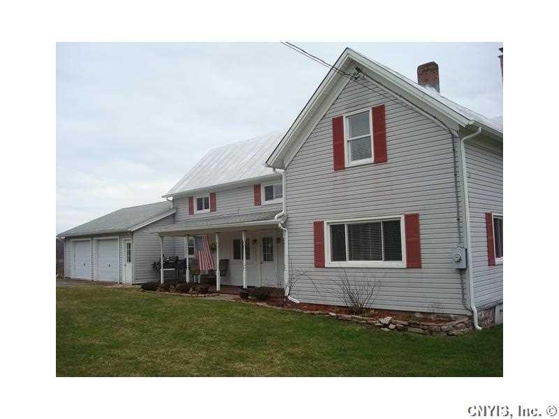 Exterior Front. Solid home over 2200 sq. ft. on 6 