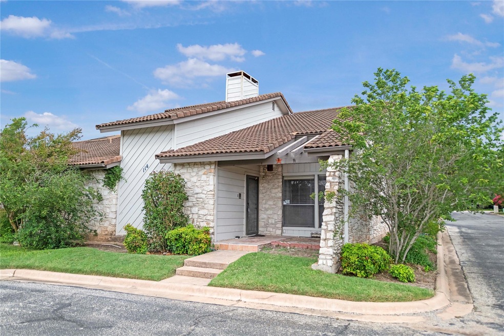 Mediterranean / spanish-style home with stone sid