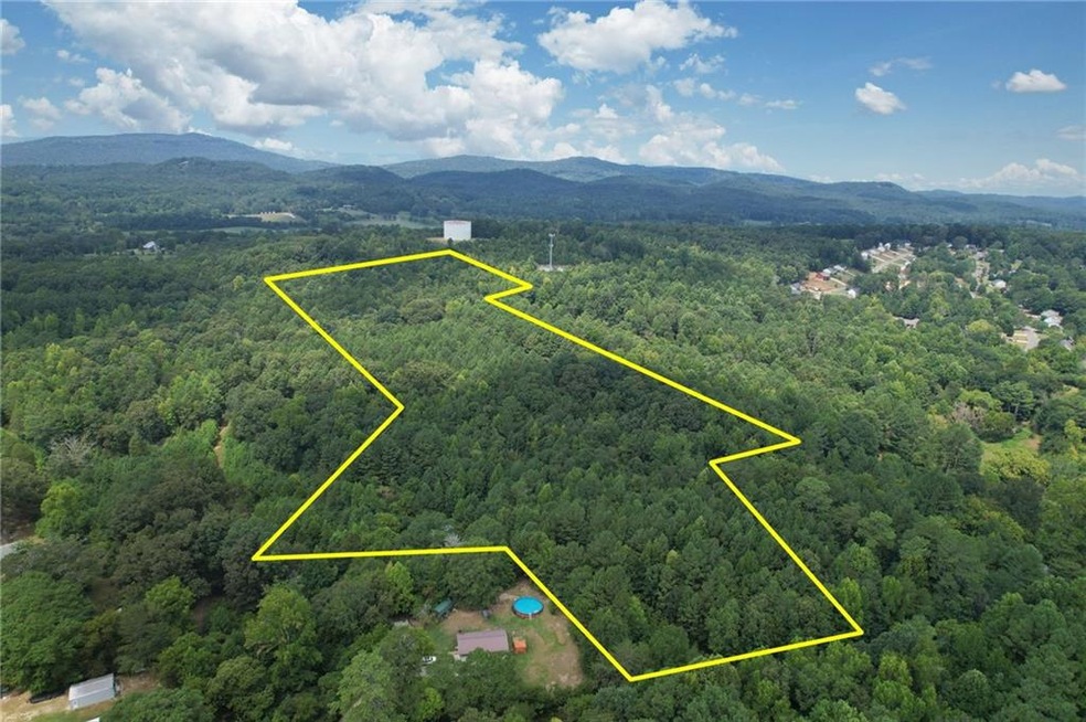 Birds eye view of property featuring a mountain vi