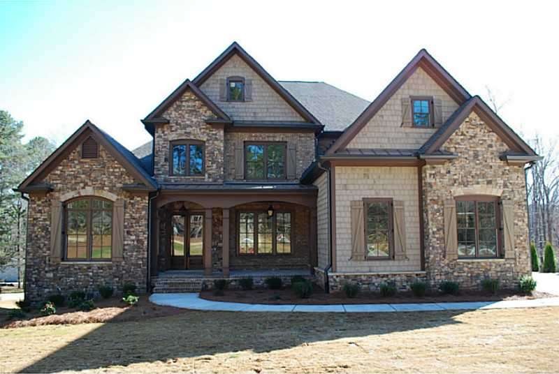 Exterior Front. Custom brick and stone elegance in