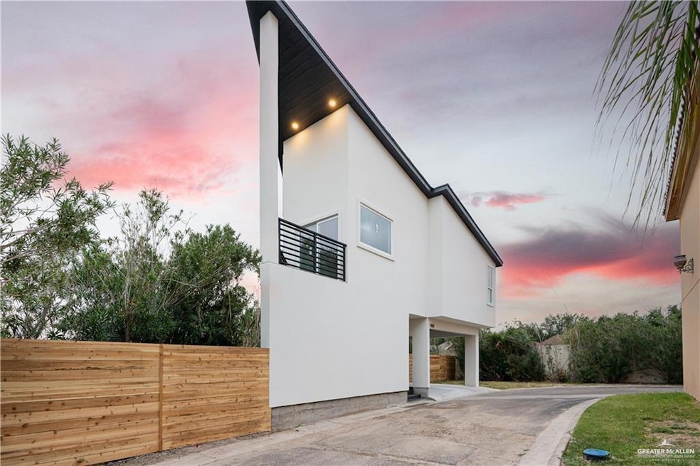 View of side of property featuring stucco siding