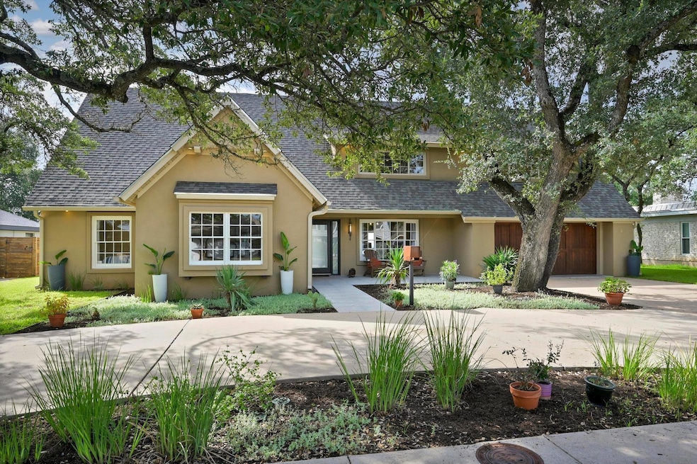 View of front of house featuring roof with shingl