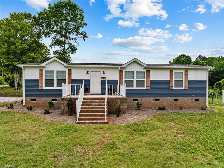 7911 Lassiter Mill Rd, Troy, NC 27371 - photo 1