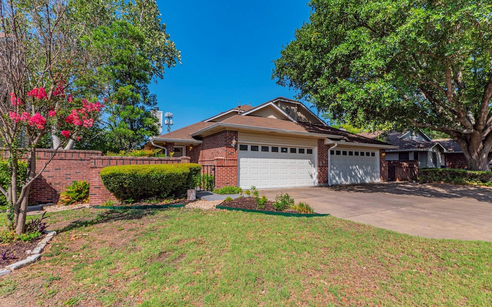 Single story home featuring an attached garage, c