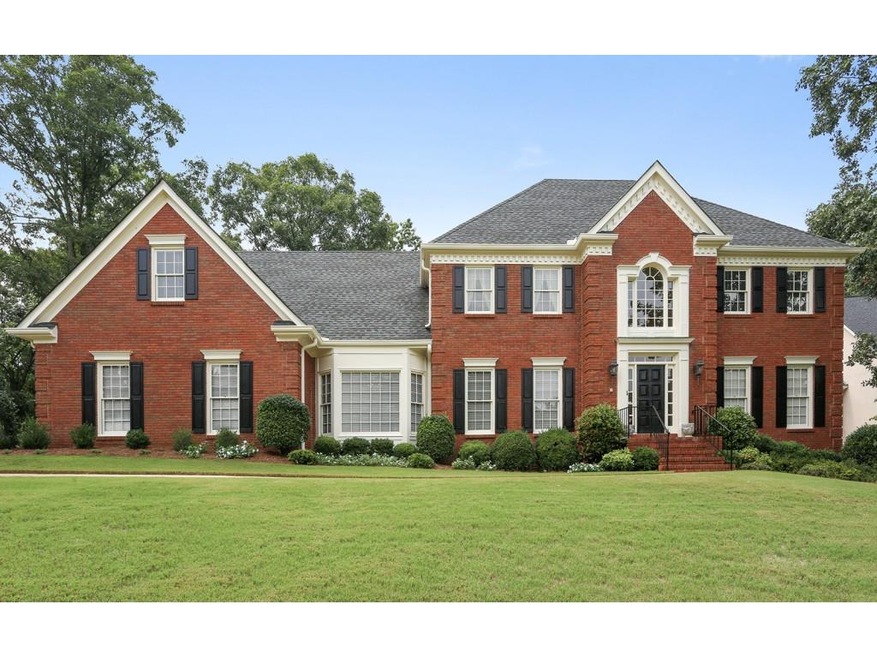 Stately 4-sided brick traditional home on 1.1 acre