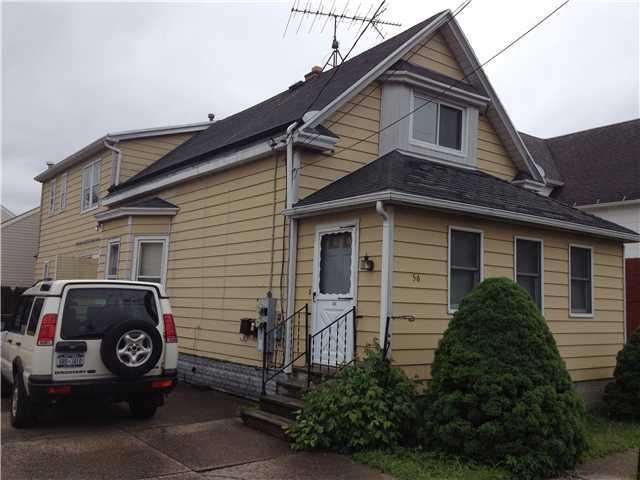 Exterior Front. Updated siding, many windows, elec