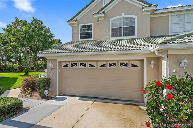 Front of townhouse with 2 car garage