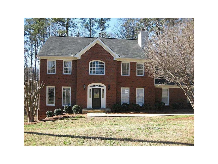 Exterior Front. Stately brick traditional home on 