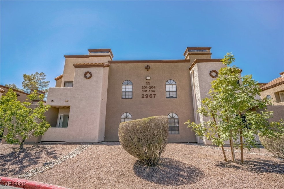 View of front of property featuring stucco siding
