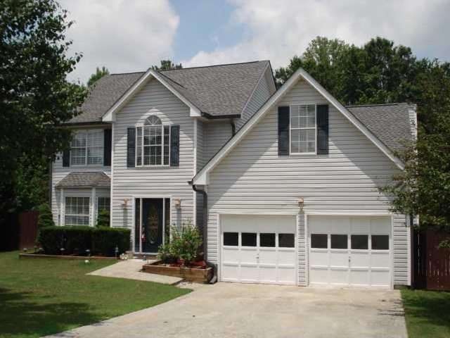Exterior Front. Low maintenance, well-cared for ho