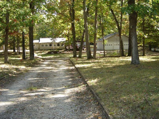 7688 N Woodbridge Rd, White Cloud, MI 49349 - photo 1