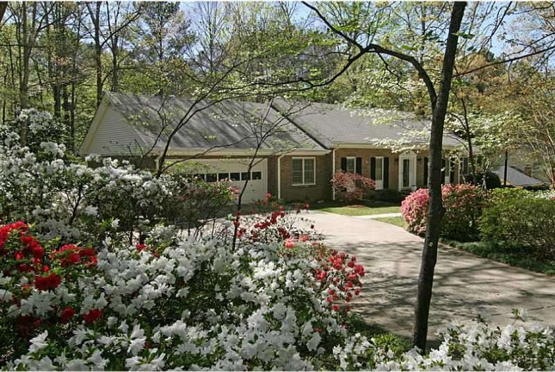 Exterior Front. Surrounded by azaleas in your own 