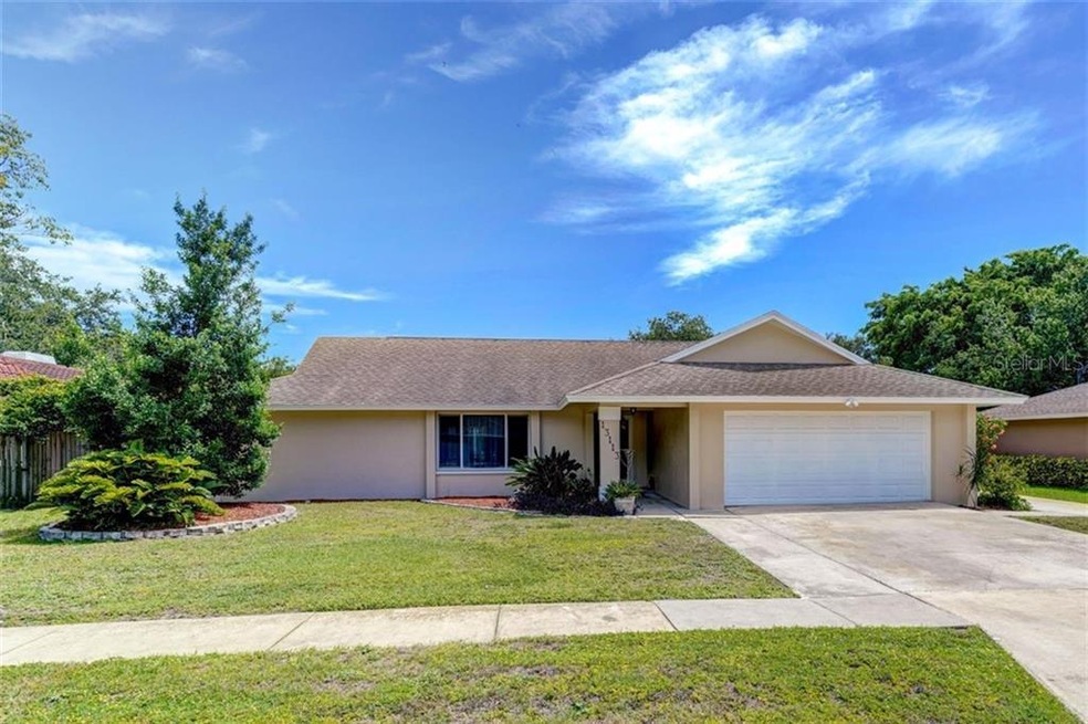 Welcome to 13113 Cimarron Cir N!