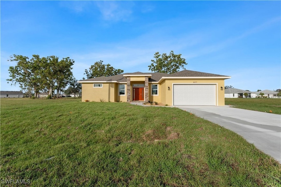 View of front of house with an attached garage, st