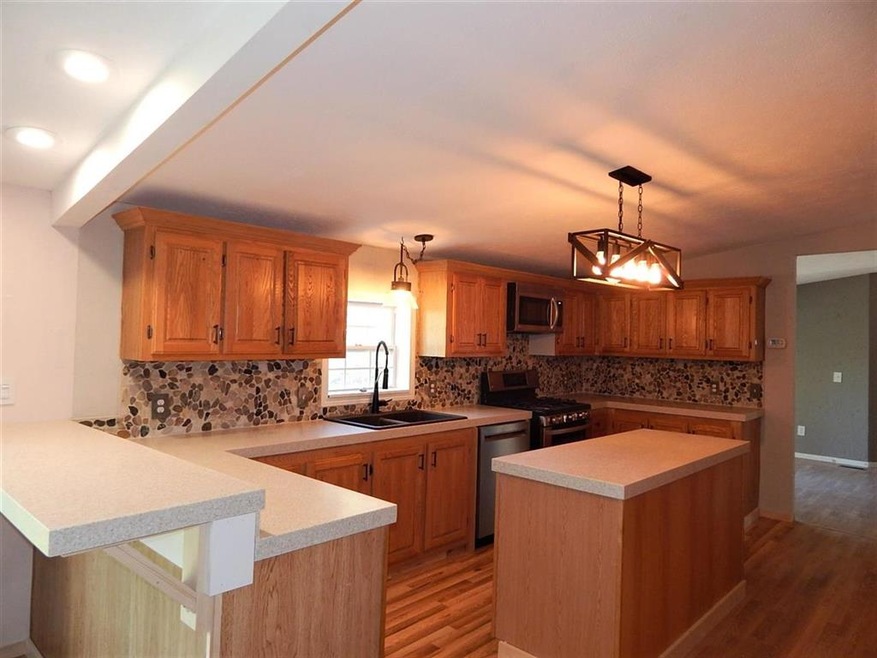 8898 Bingham Rd, Elmira, MI 49730 - photo 1