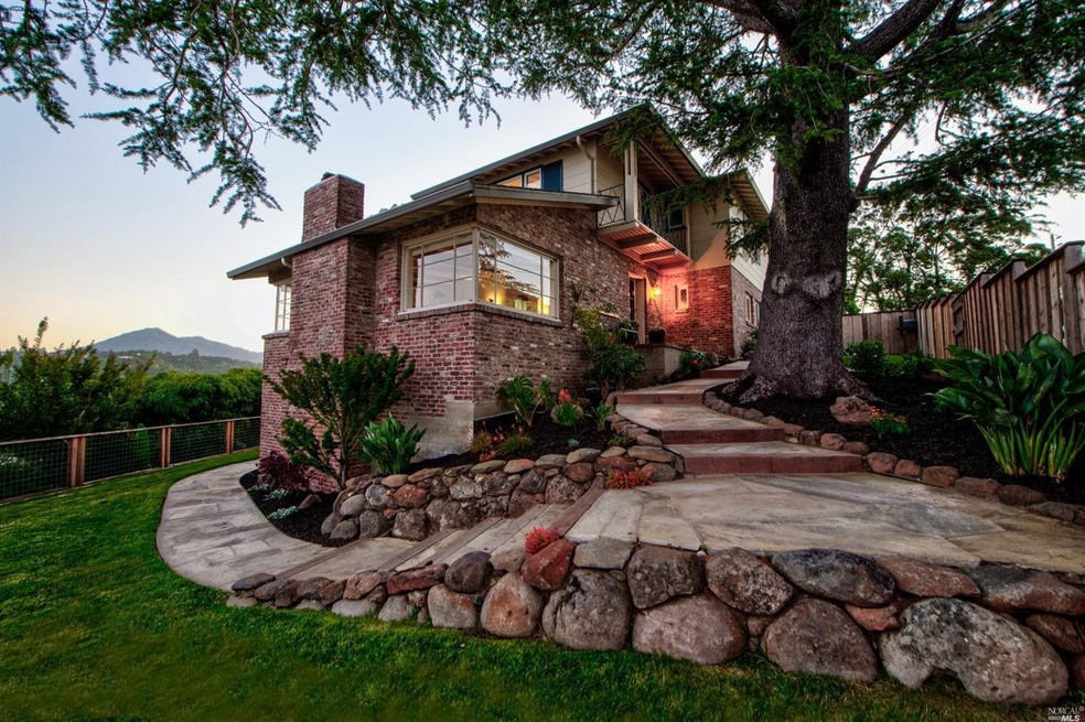 Welcome Home.   Charming home perched on a knoll t