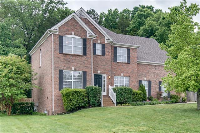 4 sides brick traditional home with 2 car side entry garage, new architectural roof and .53 acre wooded lot.