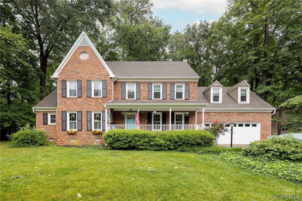 Colonial-style house with covered porch, a front l