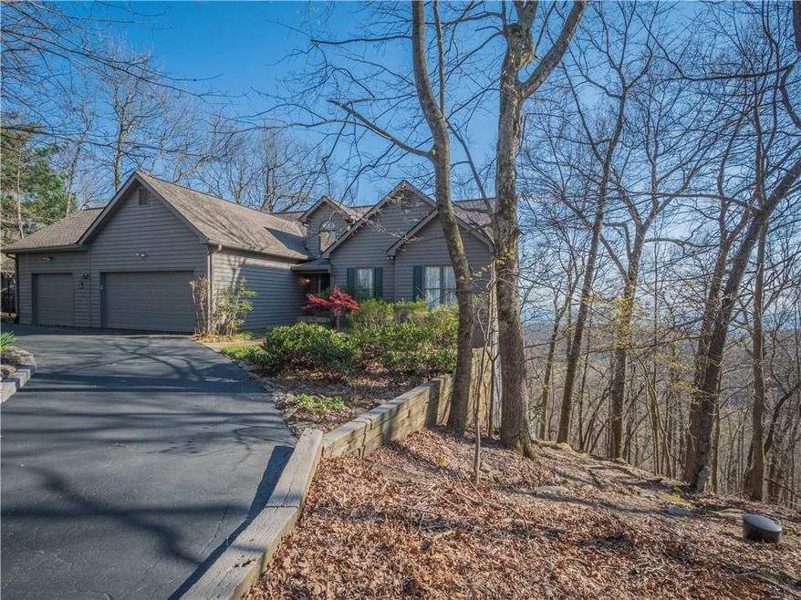 Home with stunning views features a 3 car garage a