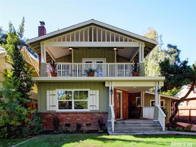 This handsome home features real redwood siding an