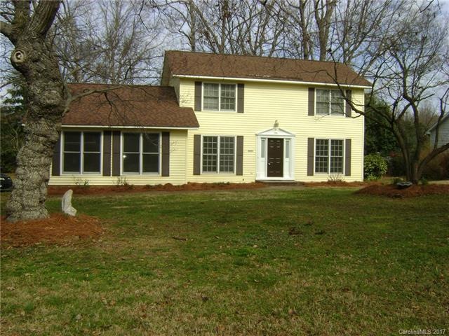 Gracious home sitting on .46 acres in established 
