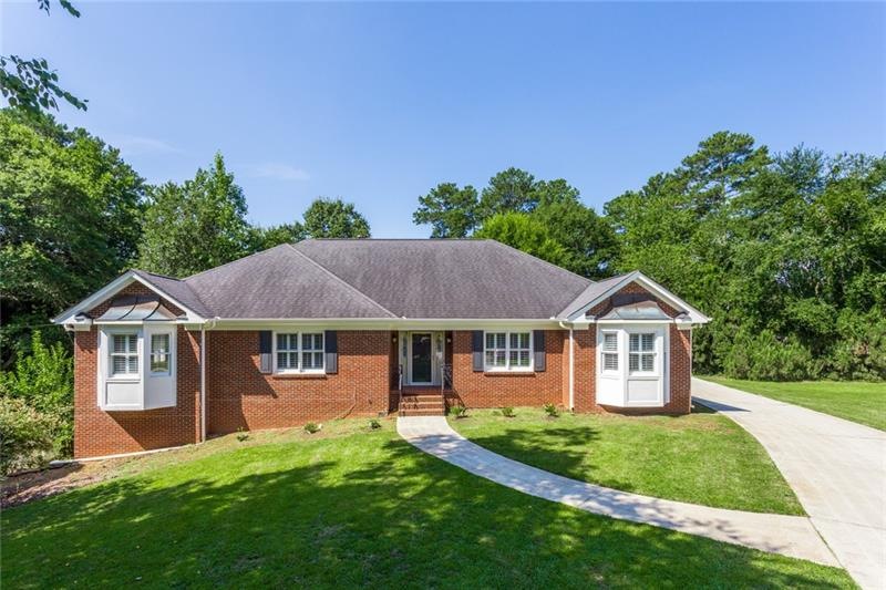 Charming, large 4 sided brick ranch in a well esta